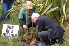 Travis Wetland Planting 2009 - Mayor Bob Parker planting  totara -3